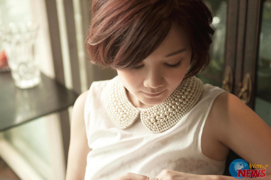 Wow!NEWS新闻网 | 海边拍摄专辑照片 情歌天后梁静茹竟是游泳健将